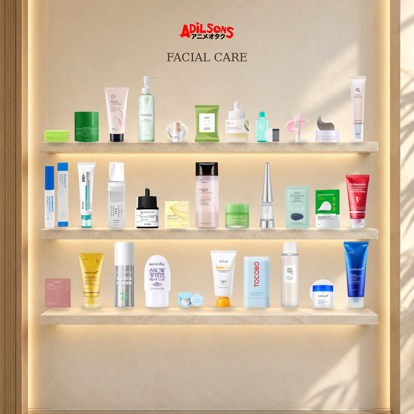 Adilsons Beauty — Facial Care collection, featuring 32 product types with their original packaging in a warm skincare display.