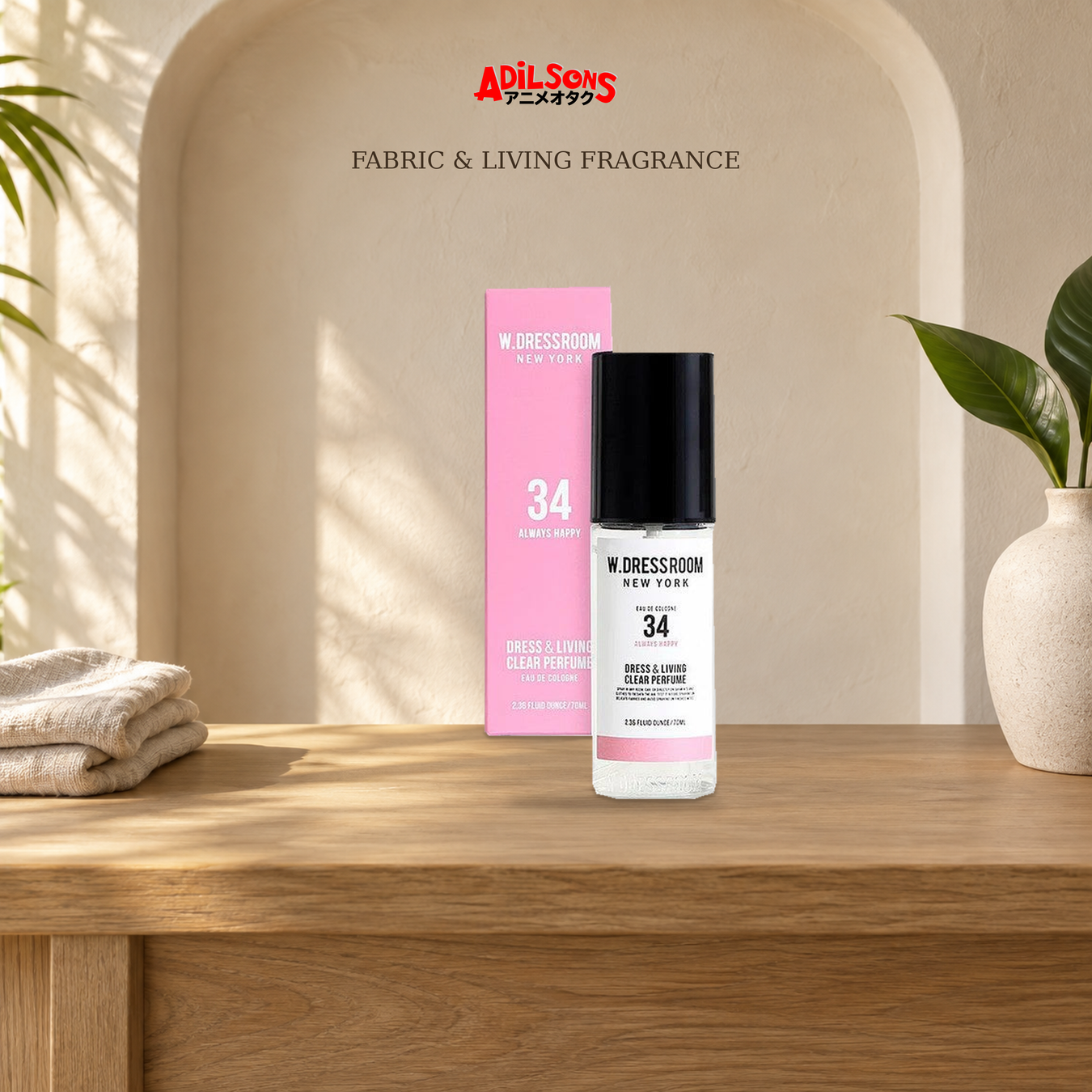 Adilsons Fabric & Living Perfume Collection: Fabric Spray displayed in a warm, faceless fragrance setting.