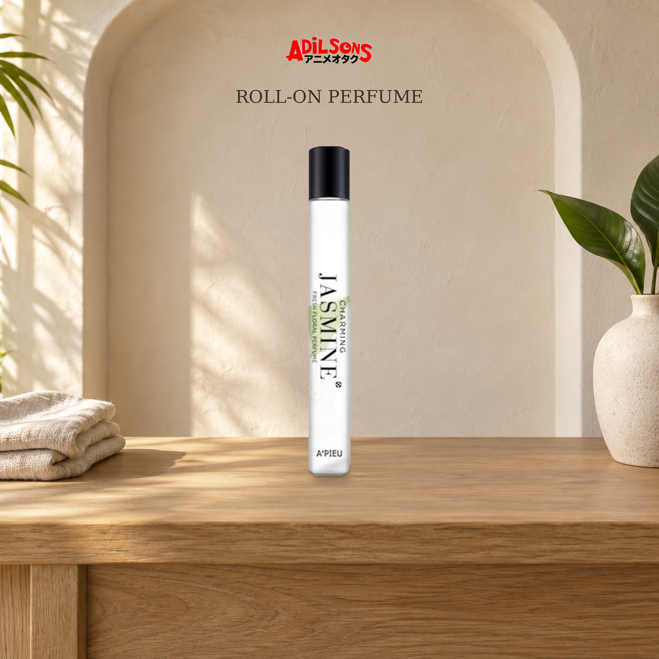 Adilsons Roll-On Perfume Collection: Roll-On Perfume displayed in a warm, faceless fragrance setting.