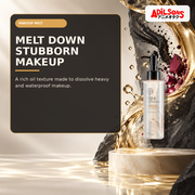 Rich cleansing oil beside abstract makeup pigments dissolving into amber oil.