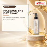 Rich cleansing oil against a circular amber ribbon suggesting massage glide.