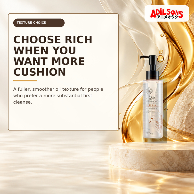 Rich cleansing oil beside a wide amber ribbon contrasted with a light translucent veil.